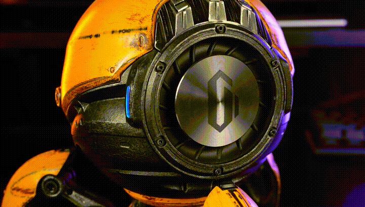 GravaStar Mars Pro Special Edition War-Damaged Yellow handcrafted Bluetooth speaker animated GIF demonstrating passive bass radiator pulsing with deep bass, featuring custom battle-worn finish, zinc alloy shell, 20-watt dual speaker system, and ice blue RGB lighting.