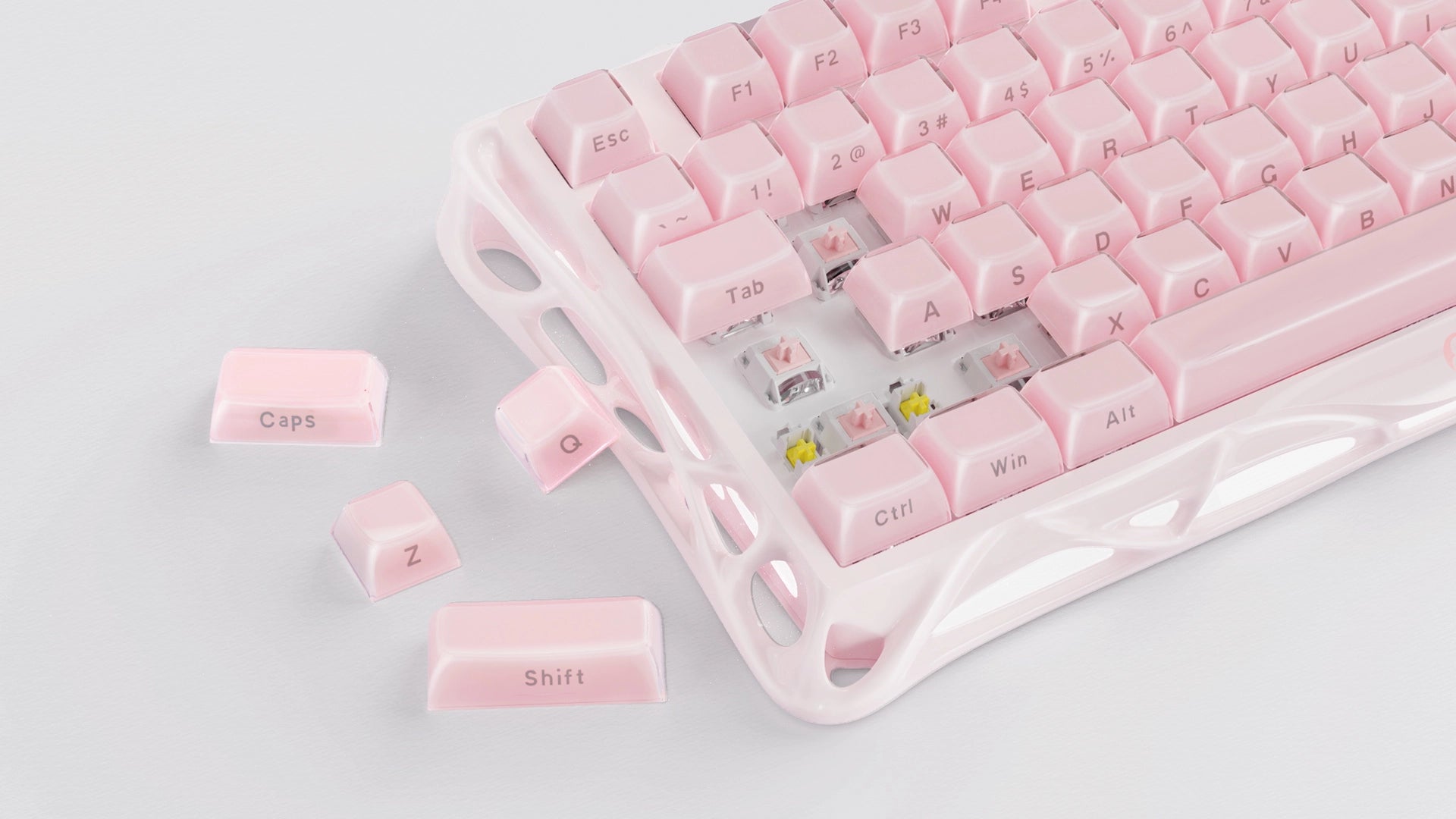 GravaStar Mercury K1 Special Edition Sakura Pink 75% wireless mechanical gaming keyboard close-up showcasing sakura pink aluminum alloy exoskeleton frame, custom 40gf linear switches, and dual-tone pink PBT keycaps.