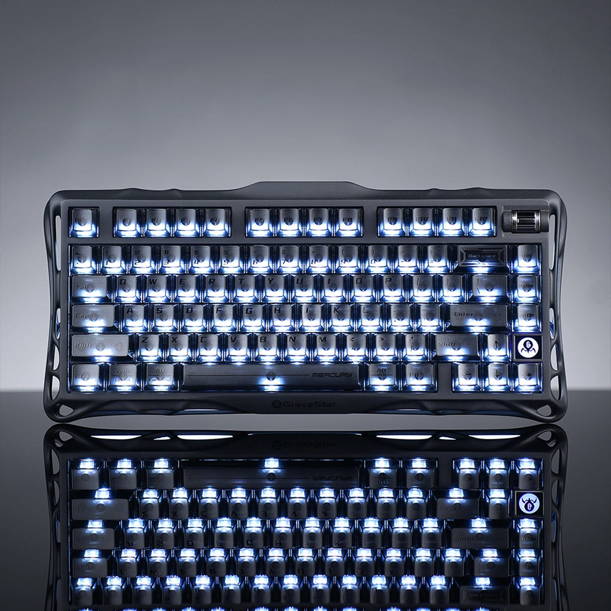 GravaStar Mercury K1 Stealth Black 75% wireless mechanical gaming keyboard featuring matte black aluminum alloy exoskeleton frame, custom Stellar Bloom linear switches, Gasket mount structure, translucent PBT keycaps, and dual RGB lighting with mirror reflection.
