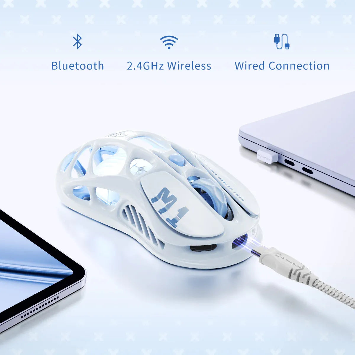 GravaStar Mercury M1 Pro Special Edition Ice Blue wireless gaming mouse diagram detailing tri-mode connectivity including Bluetooth 5.1, 2.4GHz wireless, and Type-C wired connections with PAW3395 26K DPI optical sensor and ice blue RGB lighting.