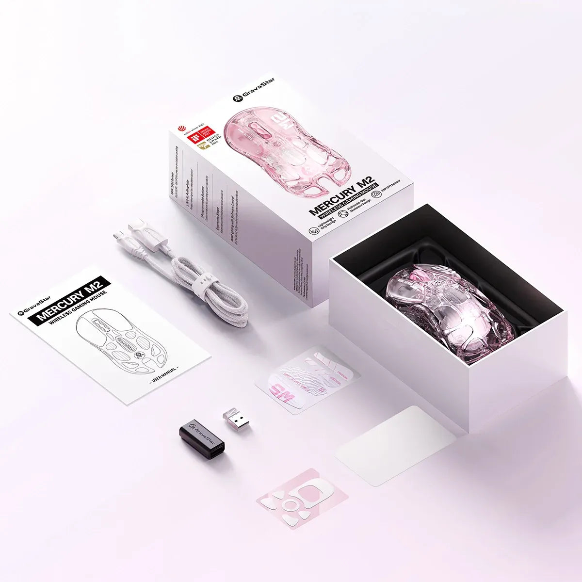GravaStar Mercury M2 Crystal Rose translucent wireless gaming mouse in-the-box accessories diagram featuring wireless mouse, USB paracord charging cable, anti-slip stickers, white Teflon foot pads, 1K receiver, USB extender adapter, cleaning cloth, and user manual, powered by PAW3395 26K DPI optical sensor.