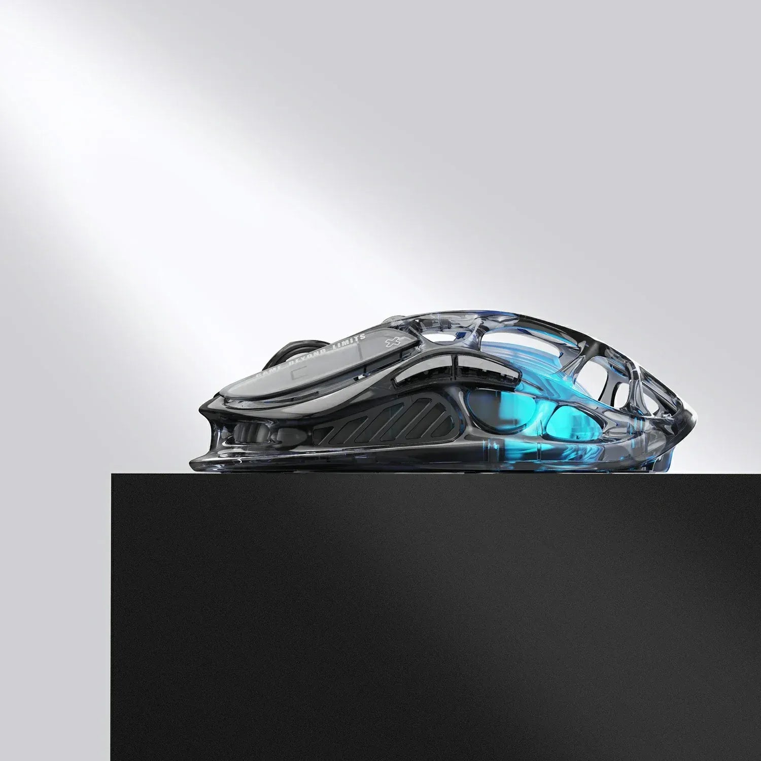 GravaStar Mercury M2 Transparent Black wireless gaming mouse featuring see-through crystal housing, 79g hollow skeletal frame design, PAW3395 26K DPI optical sensor, 1000Hz polling rate support, 5 programmable buttons, and blue RGB lighting.