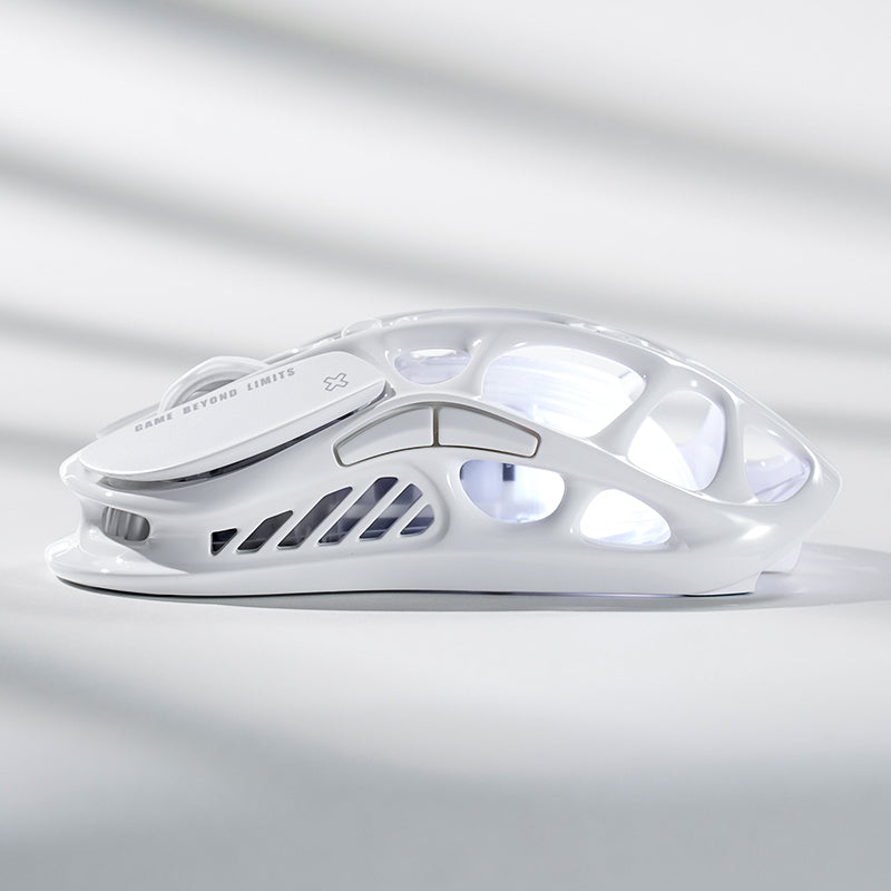 GravaStar Pro Gaming Set Opaline White Mercury M2 wireless gaming mouse side profile view showing skeletal magnesium frame and ergonomic side buttons.