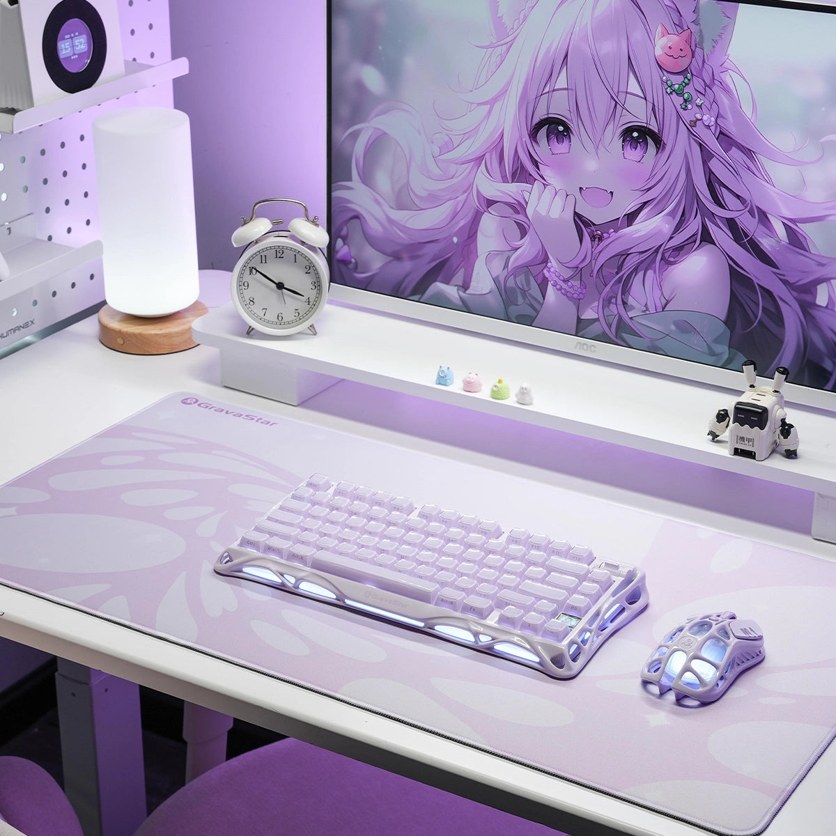 GravaStar Gaming Mouse Pad Purple extended cyberpunk deskmat studio setup view featuring waterproof micro-weave surface, purple fluid bubble grid pattern, Mercury gaming keyboard, and Mercury M1 Pro Lavender Purple gaming mouse.