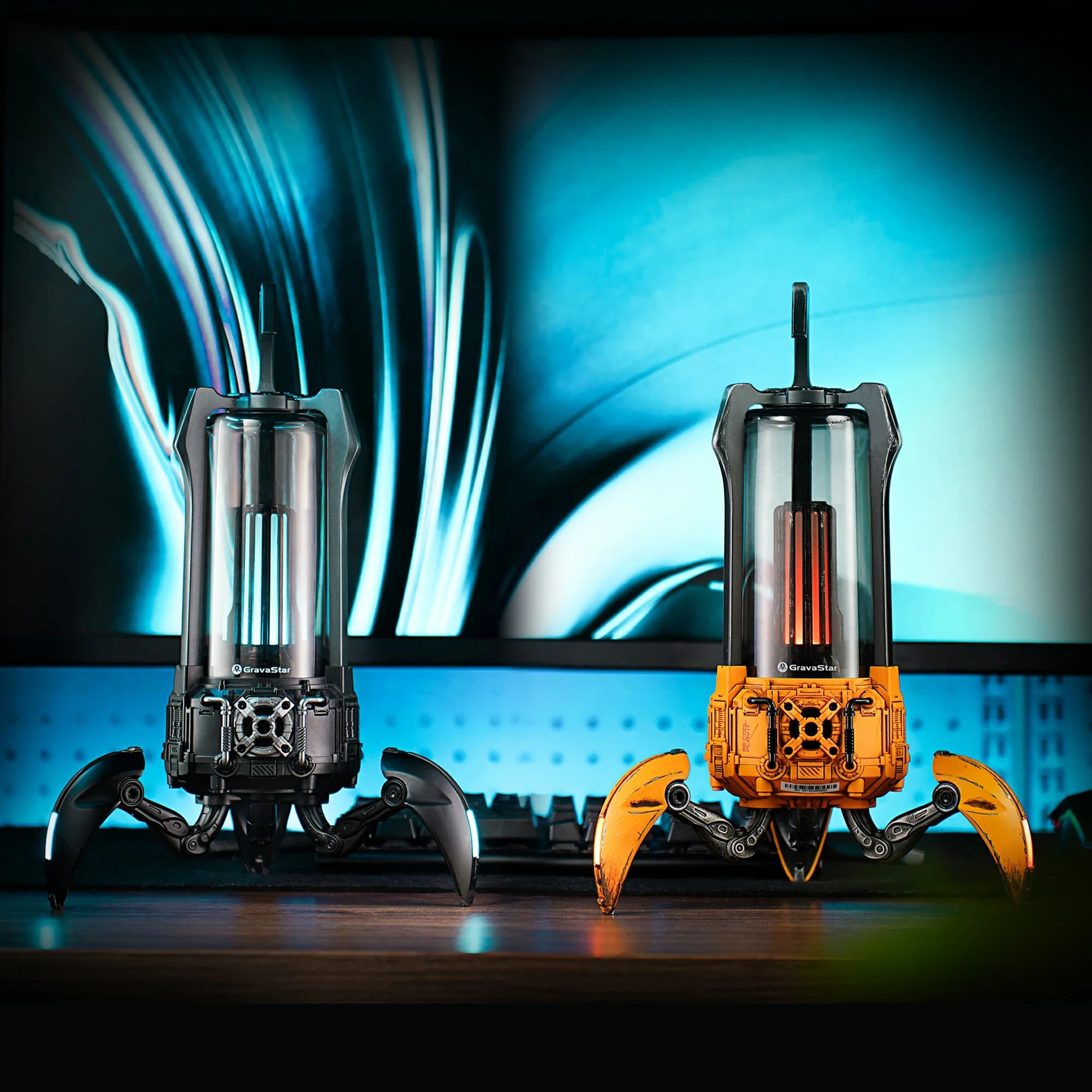 GravaStar Supernova War Damaged Yellow and Matt Black Bluetooth speakers demonstrating True Wireless Stereo pairing with Bluetooth 5.3, 25W dual-driver sound system per speaker, and customizable RGB lighting.