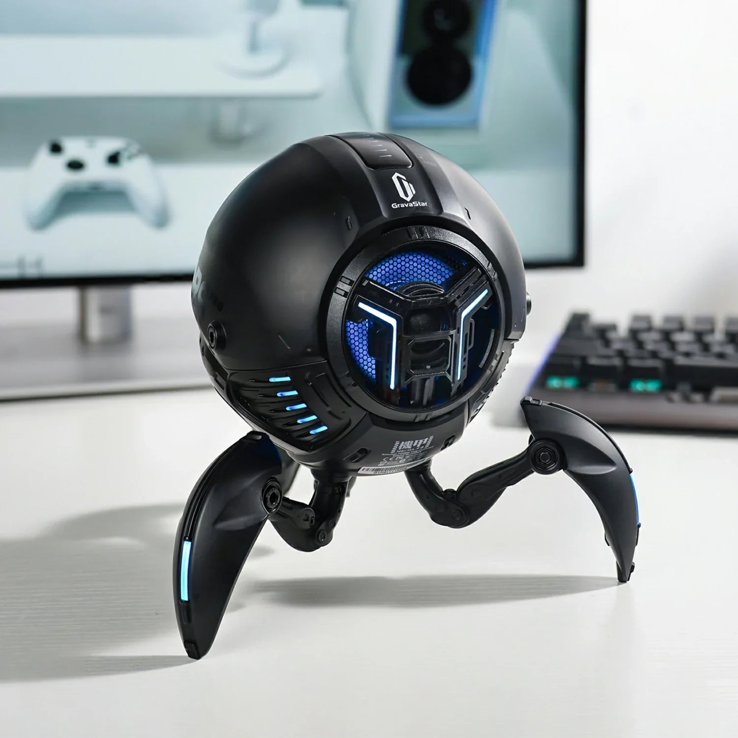 GravaStar Mars Pro Black matte zinc alloy Bluetooth speaker setup left front view featuring 20W dual speaker system, passive bass radiator, DSP equal-loudness contour, ice blue RGB lighting, and tripod legs, perfect paired with Mercury X Air Onyx Crystal mouse and Mercury V60 keyboard.