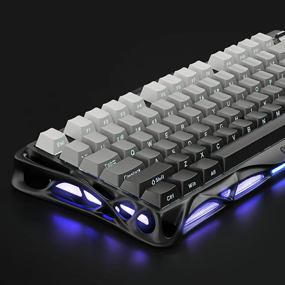 GravaStar Mercury K1 Gradient Black – Close-up view of keycaps and aluminum alloy frame, 75% wireless mechanical gaming keyboard with custom linear switches, Gasket mount, and blue-purple RGB side lighting.