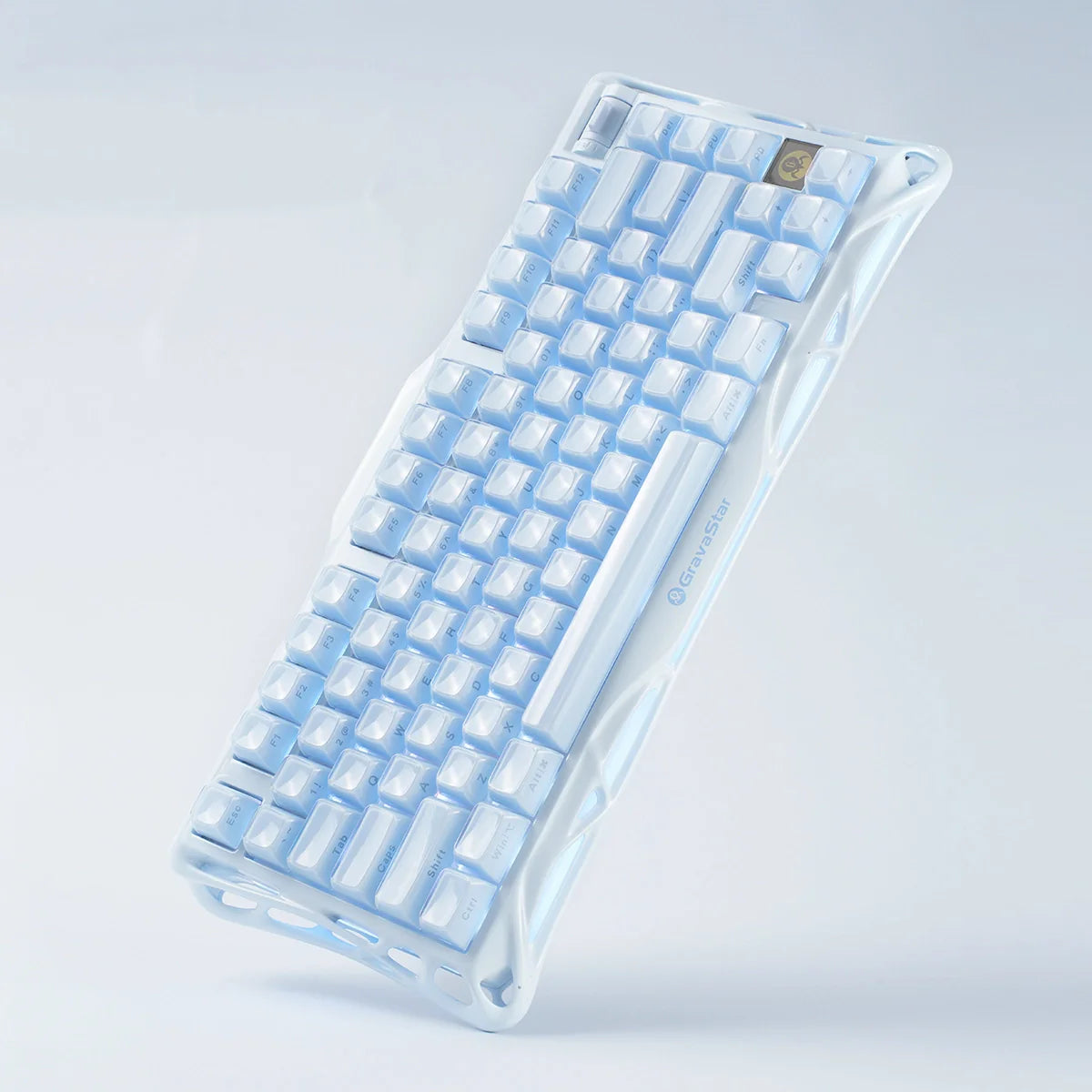 GravaStar Mercury K1 Ice Blue Edition 75% mechanical gaming keyboard – Featuring a sturdy aluminum alloy frame in matte ice blue, white and translucent keycaps, GravaStar Custom Linear Switches, and dual independent RGB backlighting with ice blue effects.