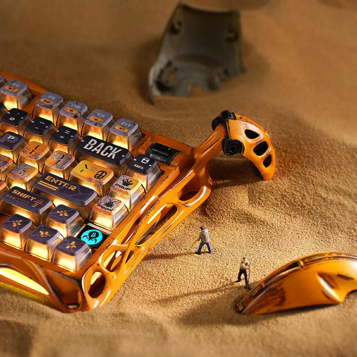 GravaStar Mercury K1 Pro Special Edition Battle-Worn Yellow – Close-up of 75% mechanical gaming keyboard showing handcrafted weathered aluminum exoskeleton, Pudding PBT dye-sub keycaps, rotary knob, and Gasket mount.