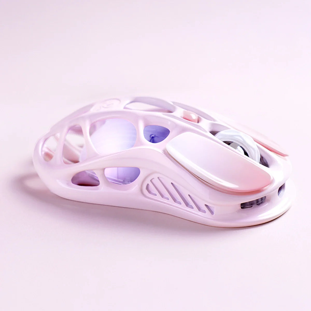 GravaStar Mercury M1 Pro Special Edition Sakura Pink wireless gaming mouse right macro angle view featuring 88g magnesium alloy skeletal frame, PAW3395 26K DPI sensor, 4KHz polling rate support, and pink RGB lighting, perfect paired with Mercury K1 Sakura Pink keyboard and Supernova speaker.