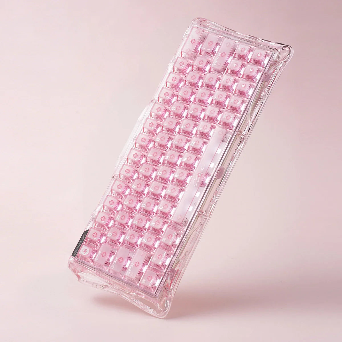 GravaStar Mercury V60 Crystal Rose 60% magnetic switch gaming keyboard featuring full-transparent rose crystal chassis, True 8kHz polling rate, 0.125ms latency, UFO Hall Effect switches, and RGB lighting, perfect paired with Mercury M2 Crystal Rose mouse and Mars Pro speaker.