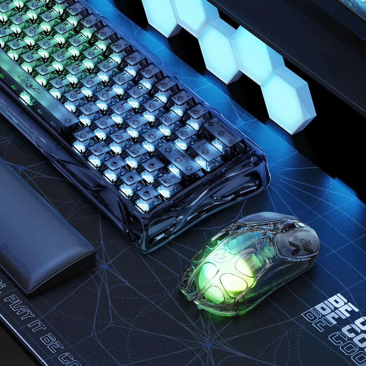 GravaStar Mercury X Air 8KHz Onyx Crystal transparent wireless gaming mouse setup view paired with Mercury V60 Onyx Crystal keyboard, featuring 56g ultralight open-frame skeletal structure, PixArt PAW 3950 32K DPI sensor, 8000Hz polling rate support, and RGB lighting.