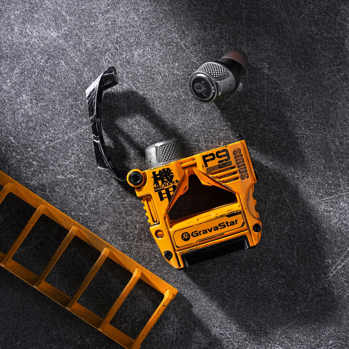 GravaStar Sirius Plus Special Edition War-Damaged Yellow handcrafted wireless ANC earbuds tactical top view with ladder accent featuring authentic weathered yellow finish, zinc aluminium alloy mecha frame, 10mm dynamic drivers, hybrid ANC, and RGB lighting, perfect paired with Mercury X Pro Yellow mouse and Mercury K1 Pro Yellow keyboard.