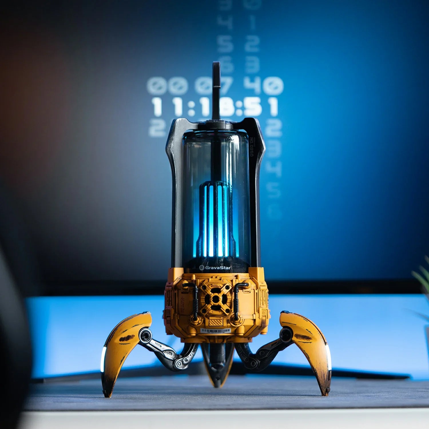 GravaStar Supernova War-Damaged Yellow handcrafted mecha-lantern Bluetooth speaker desktop setup view featuring vintage distressed yellow finish, 25W dual-driver sound system, 3" woofer, 0.5" tweeter, zinc alloy frame, foldable tripod stand, carry handle, and vibrant RGB lighting, perfect paired with Mercury X Pro Yellow mouse and Mercury K1 Pro Yellow keyboard.
