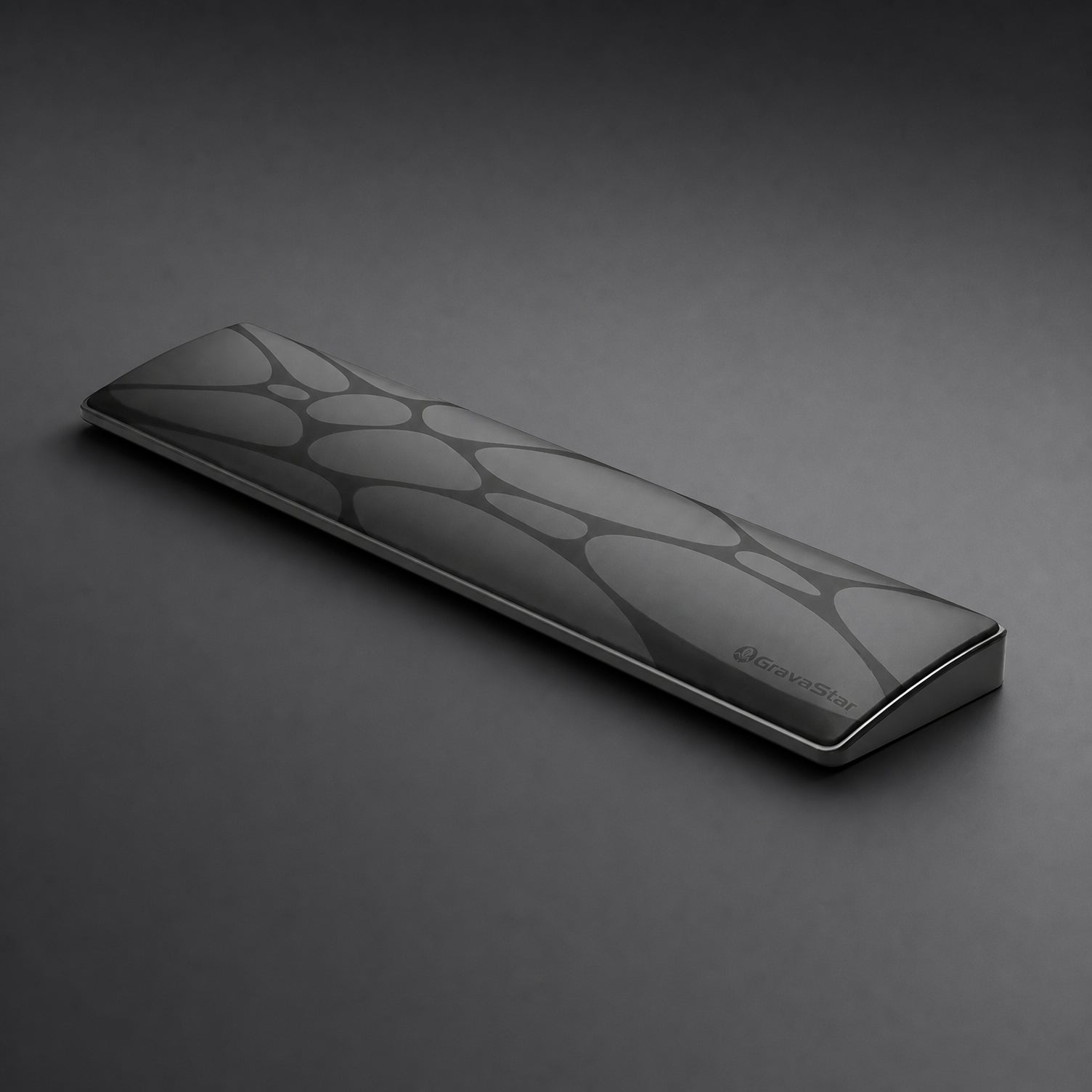 GravaStar 75% Keyboard Wrist Rest Pad Black studio 3d diagonal perspective view featuring ergonomic PU leather surface, embossed GravaStar logo, non-slip ABS base, and compact wrist alignment support, perfect paired with Mercury V75 Pro Stealth Black keyboard and Mercury M1 Pro Gunmetal Gray gaming mouse.