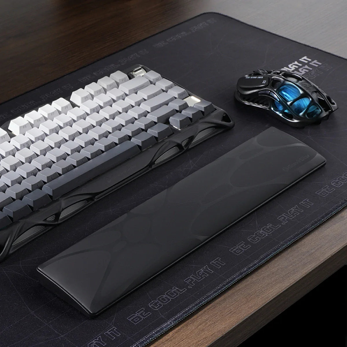 GravaStar 75% Keyboard Wrist Rest Pad Black studio full 75 percent desk setup view featuring ergonomic PU leather surface, non-slip ABS base, perfect paired with Mercury V75 Pro Stealth Black keyboard, Mercury M1 Pro Gunmetal Gray gaming mouse, and GravaStar Gaming Mouse Pad black deskmat.