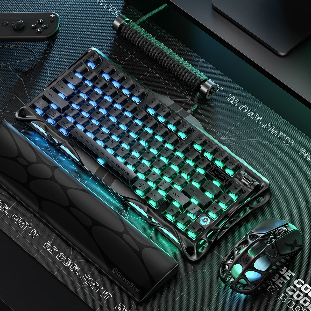GravaStar 8000Hz Ultra-Fast Hall Effect Gaming Set Stealth Black studio desktop setup perspective view showing Mercury V75 HE magnetic keyboard with Coiled Aviator USB Cable, Mercury X Pro 8KHz magnesium mouse, and 75% wrist rest pad on GravaStar Gaming Mouse Pad deskmat.