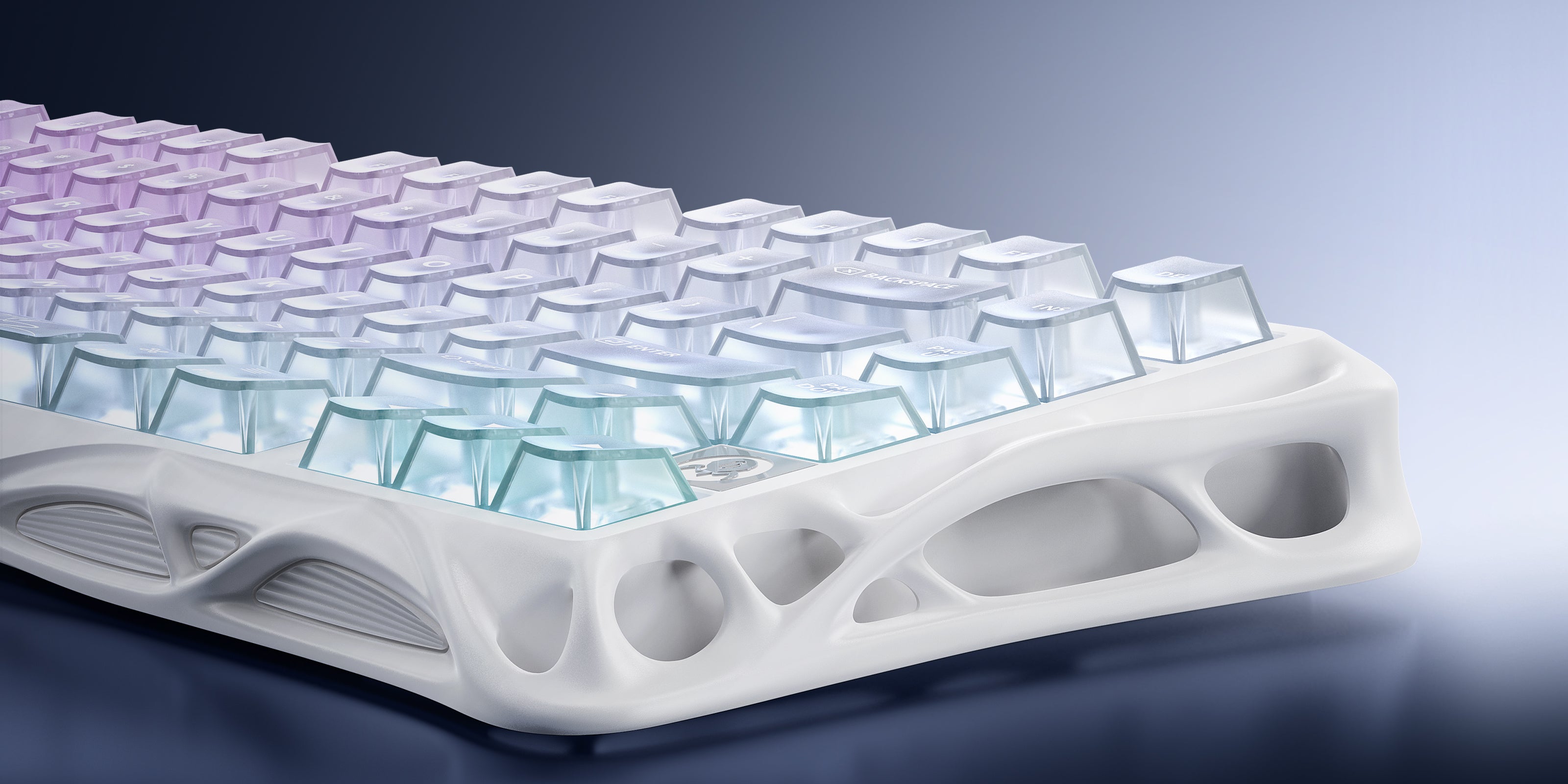 GravaStar Mercury K1 Lite Crystal Aurora 75% wireless mechanical gaming keyboard macro view featuring crystal-clear PC transparent housing, organic mecha frame curves, and purple translucent keycaps.