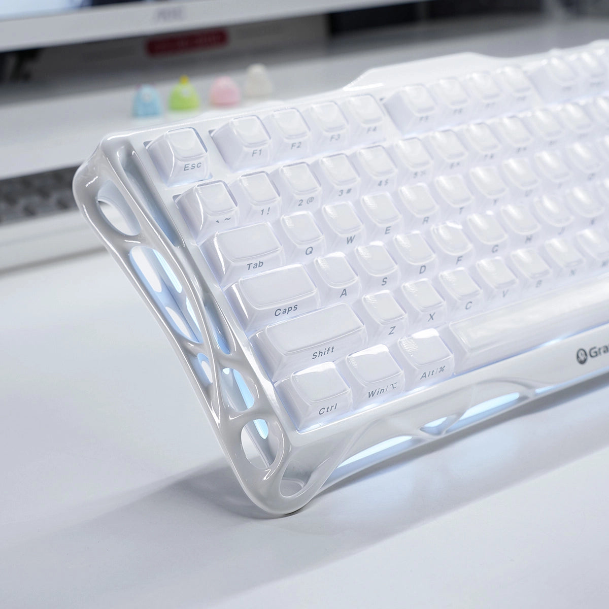 GravaStar Mercury K1 Opaline White 75% mechanical gaming keyboard close-up showing pearl white aluminum alloy chassis, PBT keycaps, custom linear switches, and ARGB backlighting.