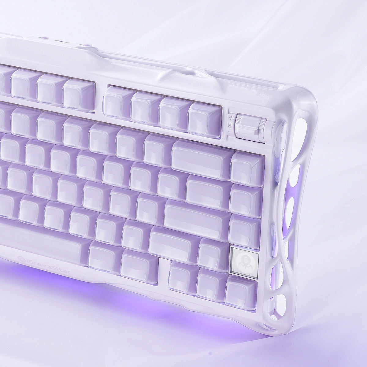GravaStar Mercury K1 Special Edition Lavender Purple 75% mechanical gaming keyboard close-up showing metallic purple aluminum alloy chassis, PBT keycaps, custom linear switches, and ARGB backlighting.