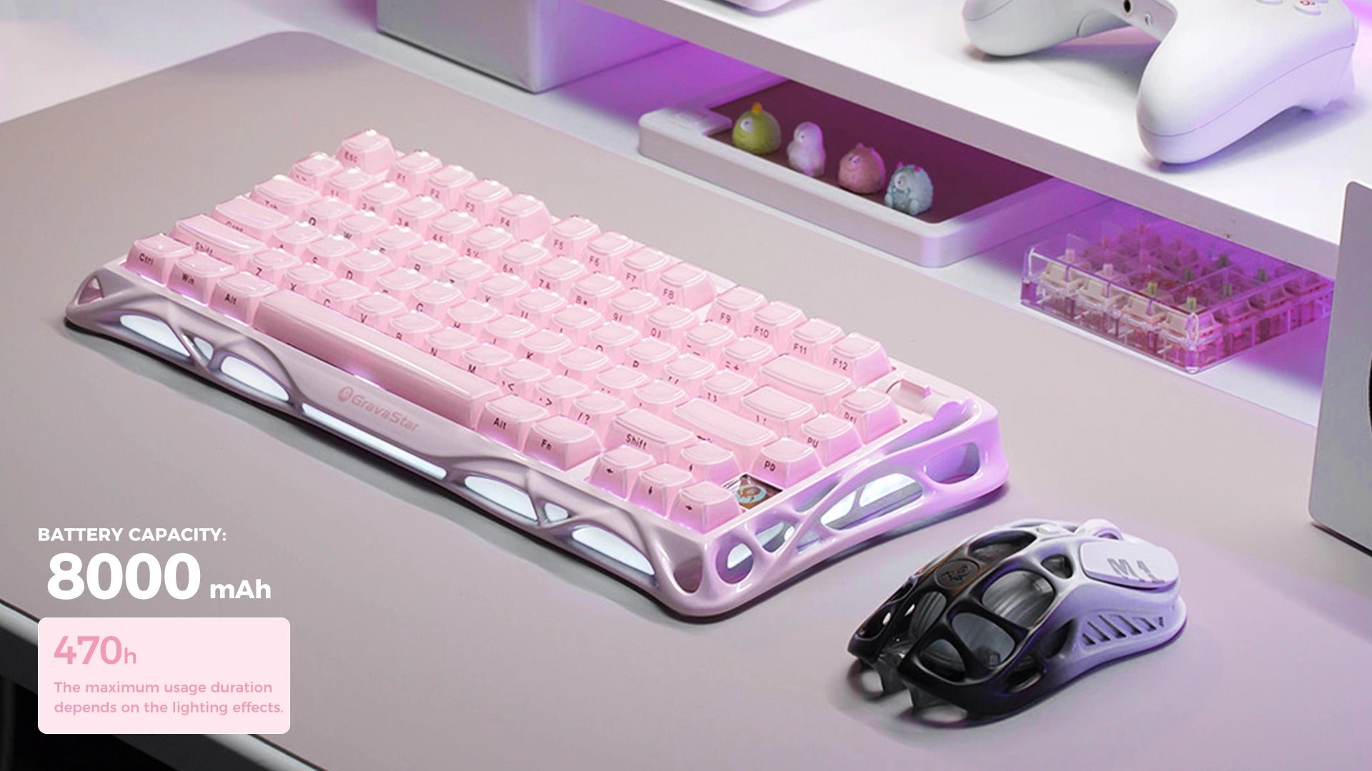 GravaStar Mercury K1 Special Edition Sakura Pink 75% wireless mechanical gaming keyboard 8000mAh rechargeable battery feature showcase providing up to 470 hours battery life in lights off mode, paired with GravaStar gaming mouse in a desktop setup.