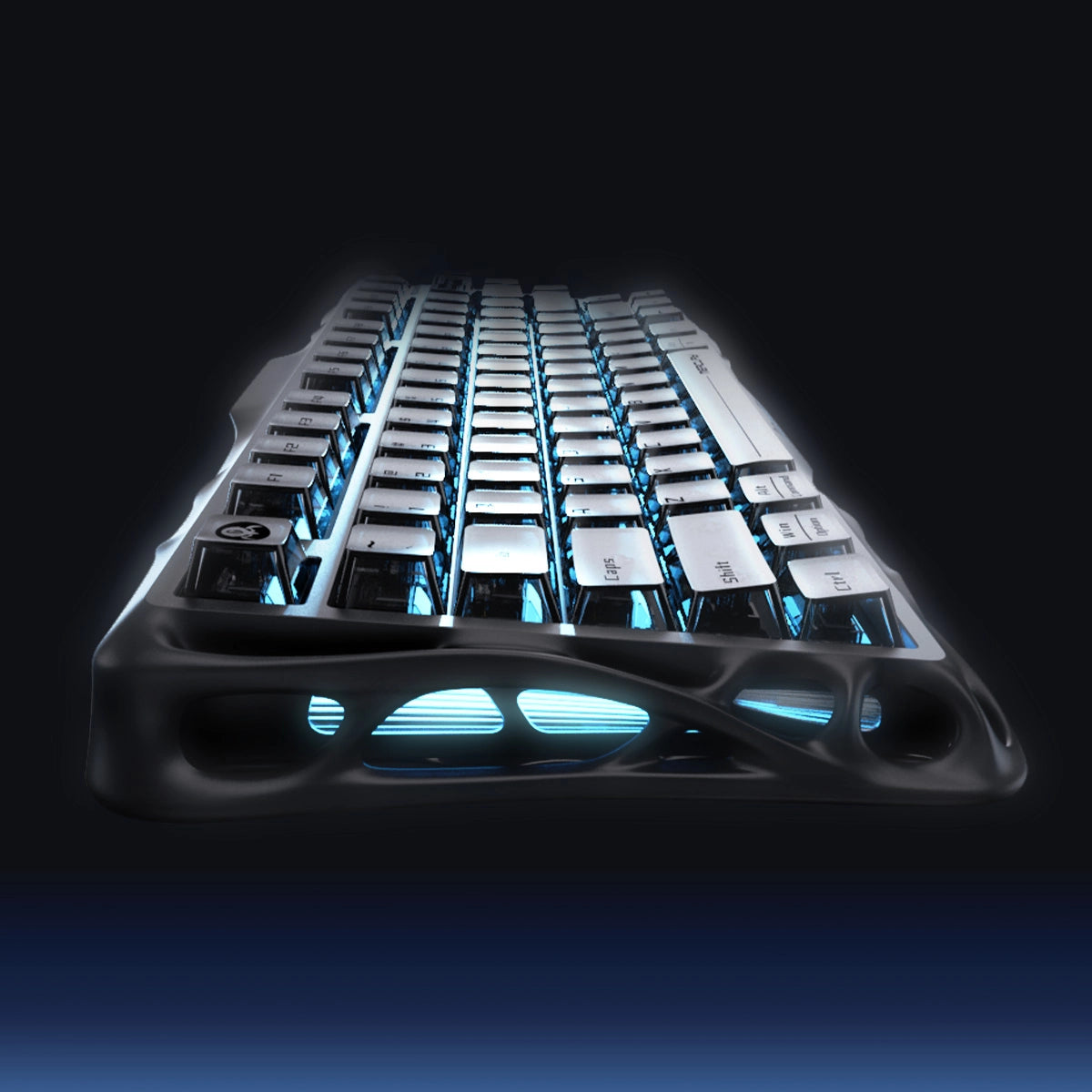 GravaStar Mercury K1 Stealth Black 75% wireless mechanical gaming keyboard close-up showcasing matte black aluminum alloy exoskeleton chassis, engraved GravaStar logo, translucent PBT keycaps, and dual-zone ice blue RGB backlighting.
