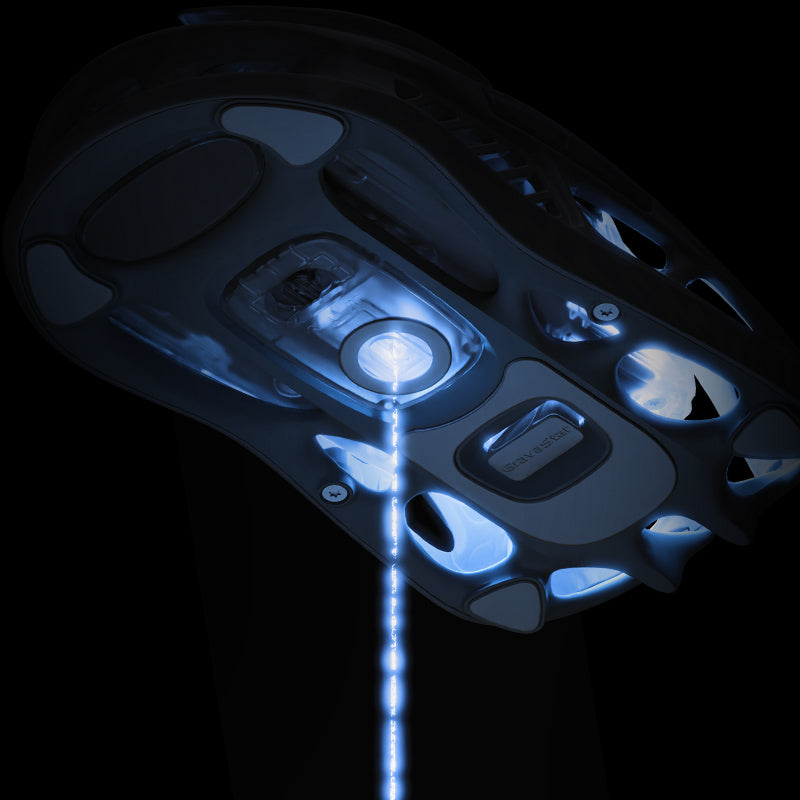 GravaStar Mercury M1 Pro Ice Blue wireless gaming mouse bottom chassis detail showing PAW3395 26K DPI optical sensor, PTFE foot pads, tri-mode connection switch, and customizable GlowSync RGB lighting.