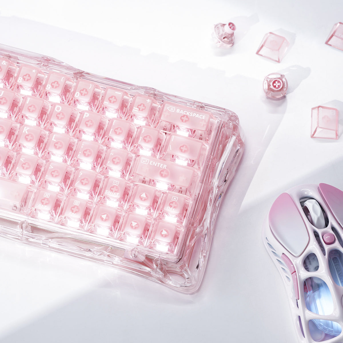 GravaStar Mercury V60 Crystal Rose 60% magnetic gaming keyboard macro view highlighting full-transparent rose crystal chassis, UFO Hall Effect switches, True 8kHz polling rate, 0.125ms latency, paired with Mercury M2 Crystal Rose gaming mouse and custom transparent rose keycaps.