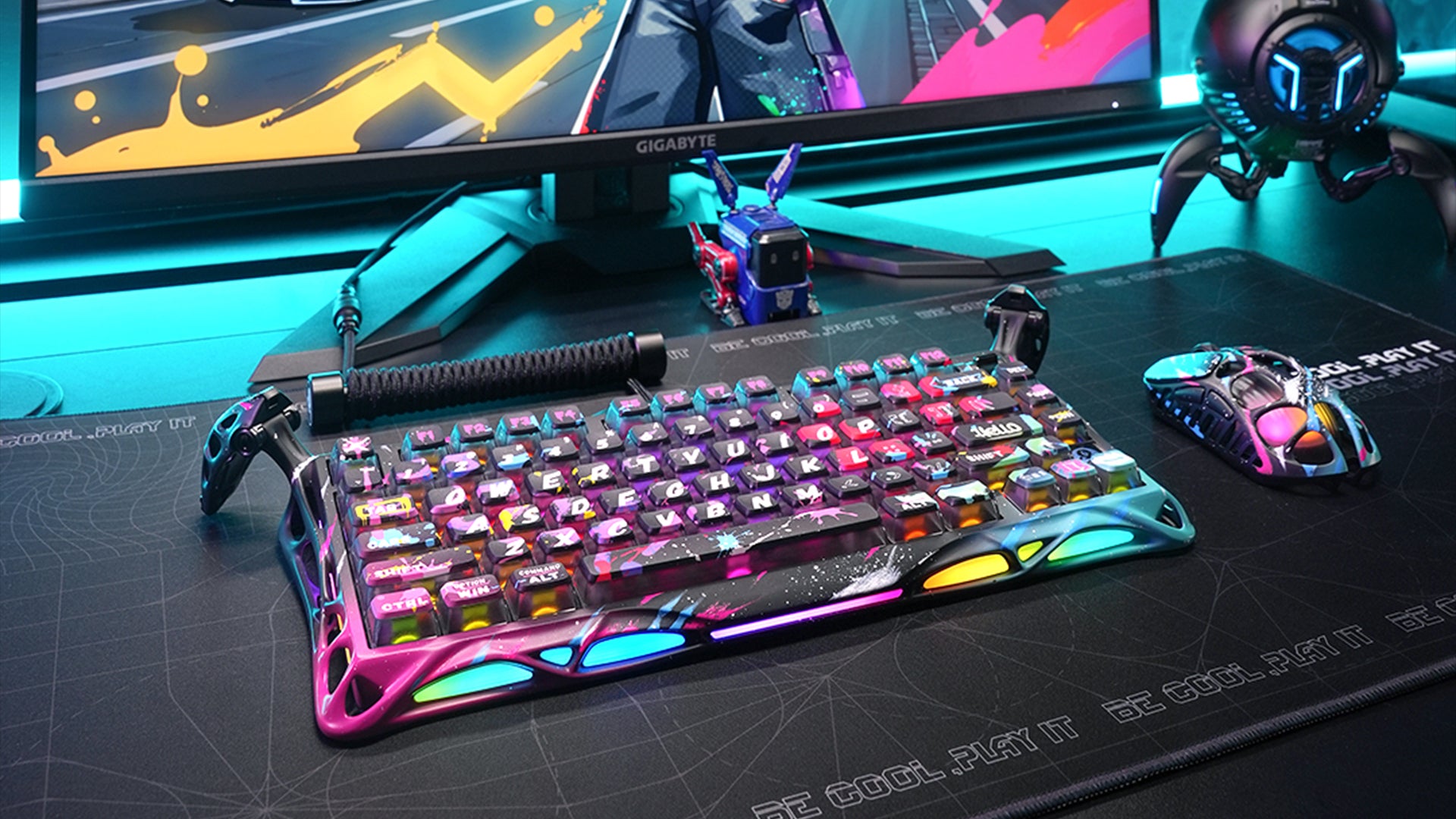 GravaStar HE 8000Hz Ultra-Fast Hall Effect Gaming Set Neon Graffiti studio setup featuring Mercury V75 Pro magnetic keyboard with 0.125ms latency, hand-painted street art aluminum frame, Mercury X Pro 8KHz 49g magnesium alloy wireless mouse, Mars Pro Neon Graffiti speaker, Coiled Aviator USB Cable, and GravaStar gaming deskmat.
