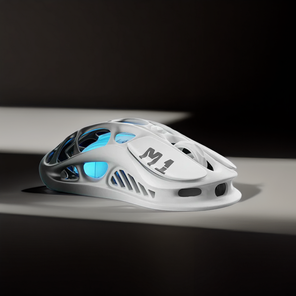 GravaStar Pro Gaming Set Gradient Black Mercury M1 Pro wireless gaming mouse side view featuring magnesium alloy skeletal frame, M1 logo, anti-slip side grips, and blue RGB backlighting.