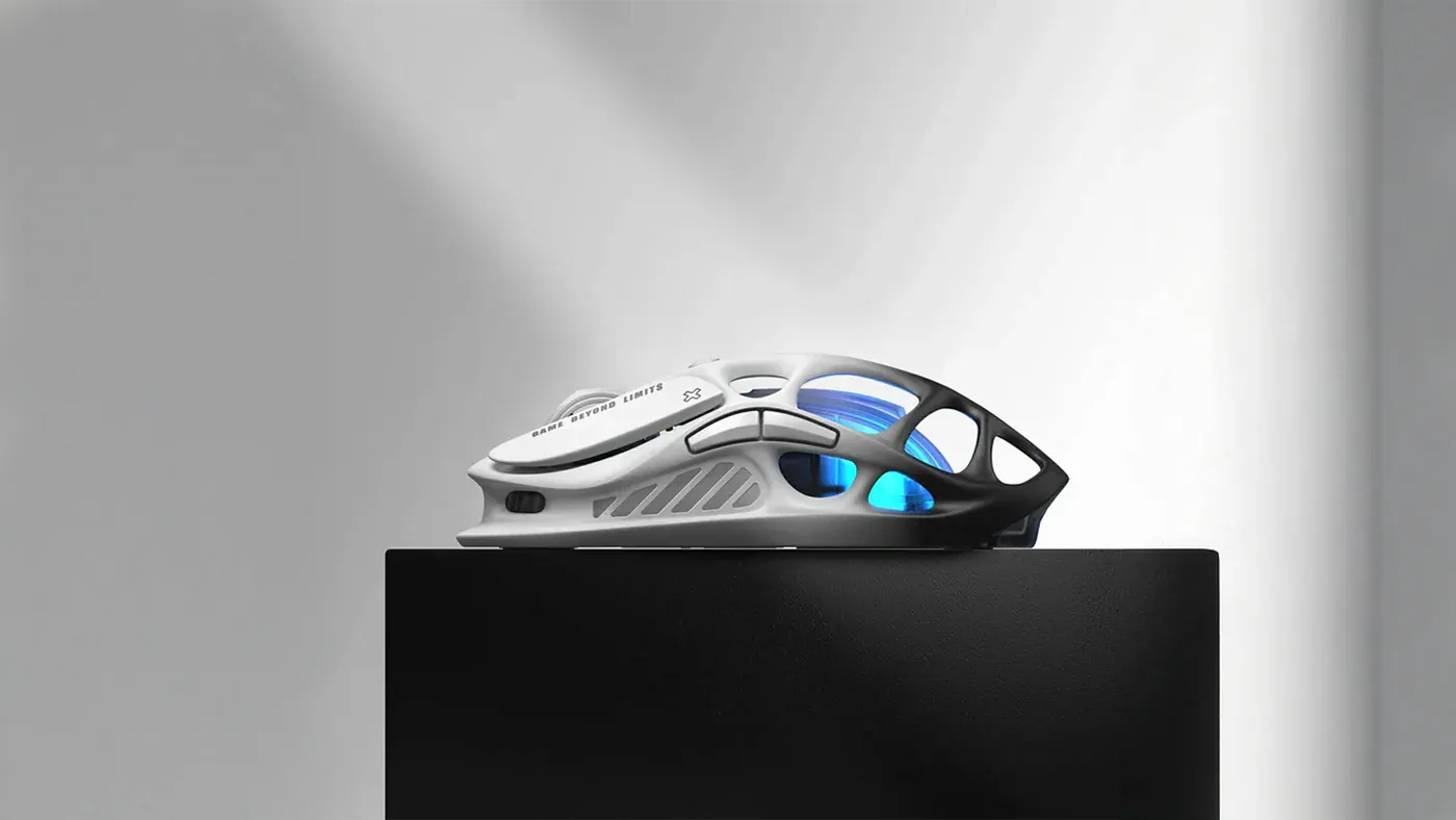 GravaStar Pro Gaming Set Gradient White Mercury M1 Pro wireless gaming mouse profile side view featuring magnesium alloy skeletal frame with ice blue RGB backlighting on display stand.