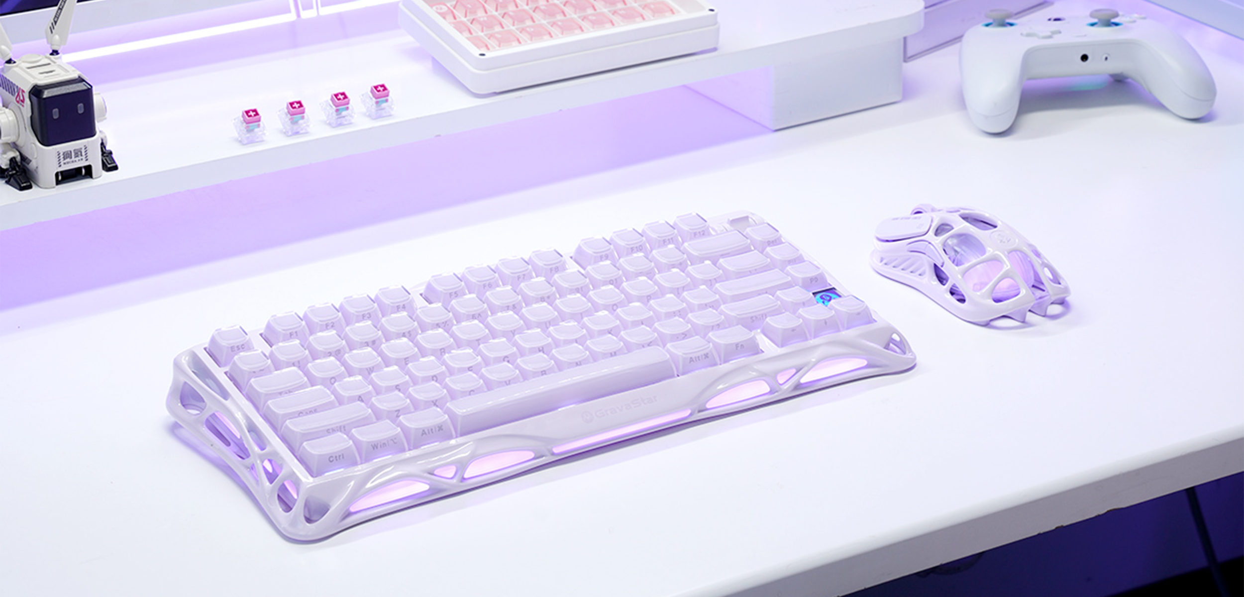 GravaStar Pro Gaming Set Lavender Purple desk setup banner featuring Mercury K1 Special Edition 75% wireless mechanical keyboard, Mercury M1 Pro magnesium alloy wireless mouse, Alpha65 charger, and wireless controller.