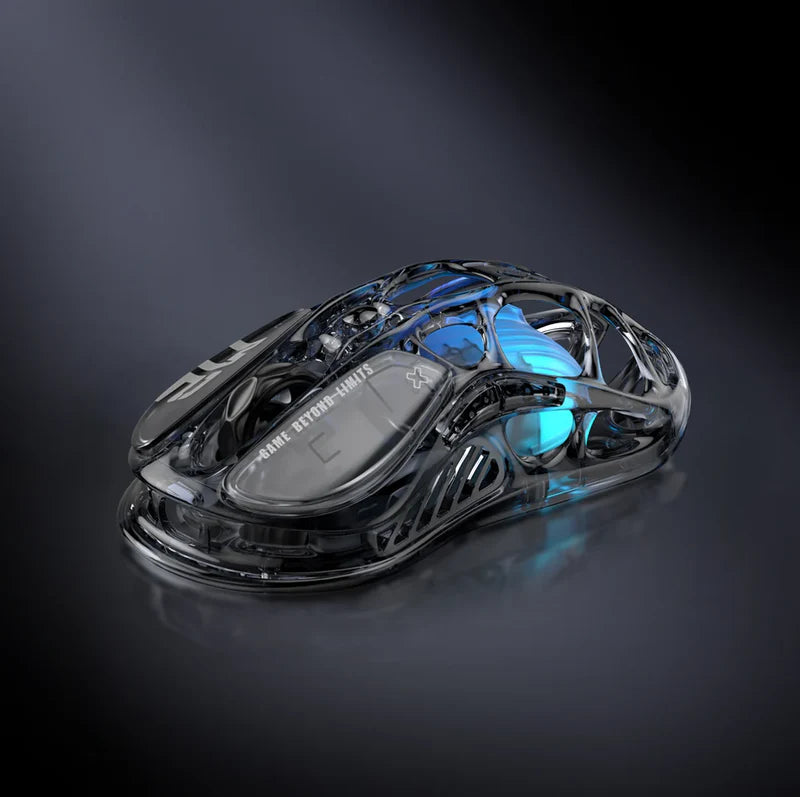 GravaStar Core Flex Gaming Set Transparent Black studio Mercury M2 gaming mouse skeletal chassis close-up view featuring transparent crystal housing, PAW3395 26K DPI sensor, 79g lightweight hollow design, and GLOWSYNC blue RGB lighting, perfect paired with Mercury K1 Lite keyboard and GravaStar Gaming Mouse Pad black deskmat.