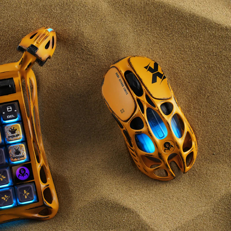 GravaStar Handcrafted Gaming Set Battle-Worn Yellow studio Mercury X Pro 8KHz gaming mouse desert scene top-down view featuring handcrafted 49g magnesium alloy hollow frame, PAW 3950 32K DPI sensor, native 8000Hz polling rate, and blue RGB backlighting, perfect paired with Mercury K1 Pro keyboard and Mars Pro Yellow speaker.