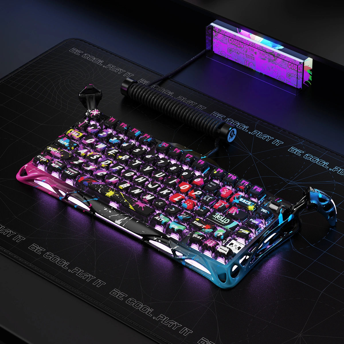 GravaStar HE 8000Hz Ultra-Fast Hall Effect Gaming Set Neon Graffiti Mercury V75 Pro magnetic keyboard desktop setup view connected with Coiled Aviator USB Cable, featuring hand-painted street art aluminum frame, GravaStar UFO switches, and 8kHz polling rate, perfect paired with Mercury X Pro Neon Graffiti mouse and Mars Pro Neon Graffiti speaker.