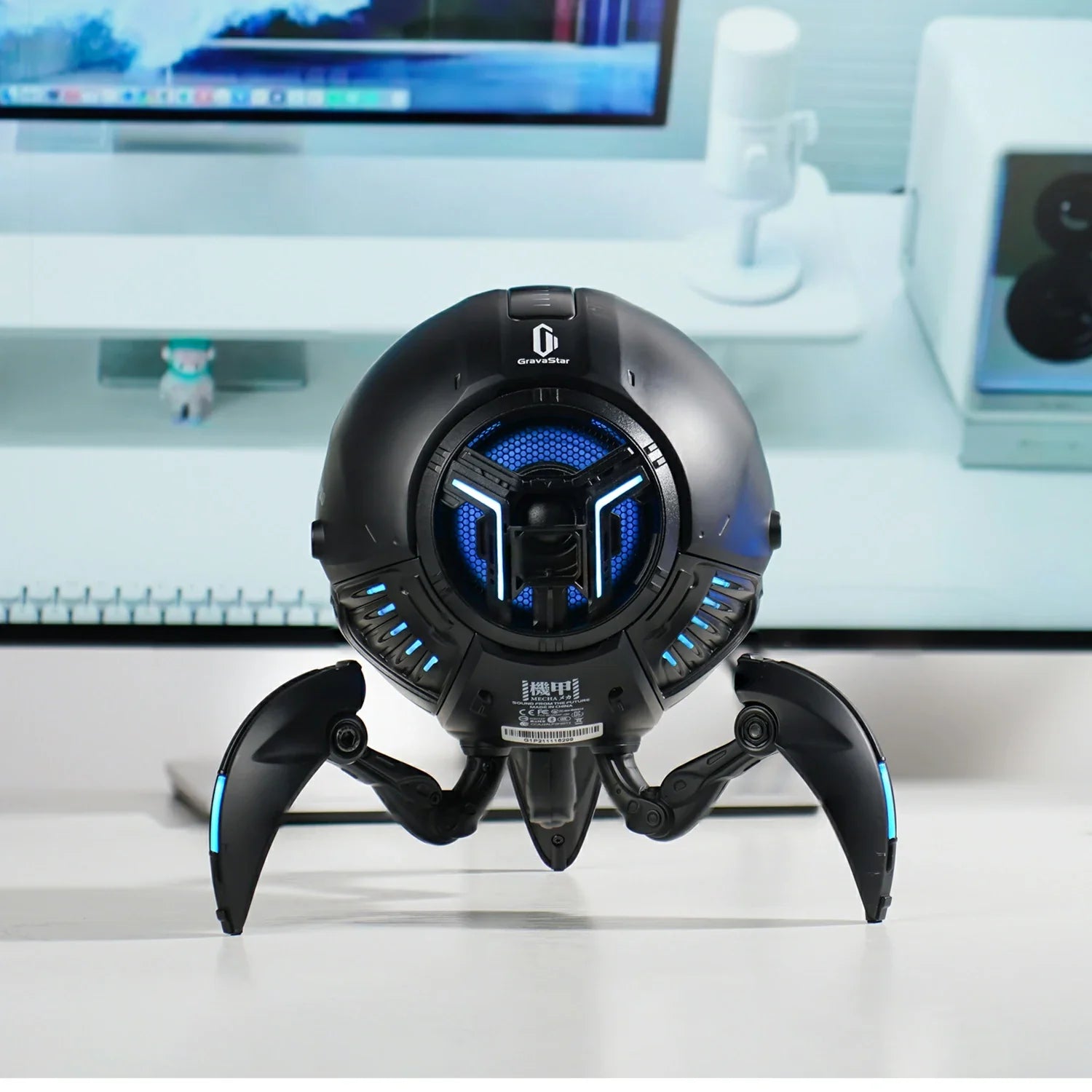 GravaStar Mars Pro Black matte zinc alloy Bluetooth speaker desktop front view featuring 20W dual speaker system, passive bass radiator, DSP equal-loudness contour, ice blue RGB lighting, and tripod legs, perfect paired with Mercury X Air Onyx Crystal mouse and Mercury V60 keyboard.