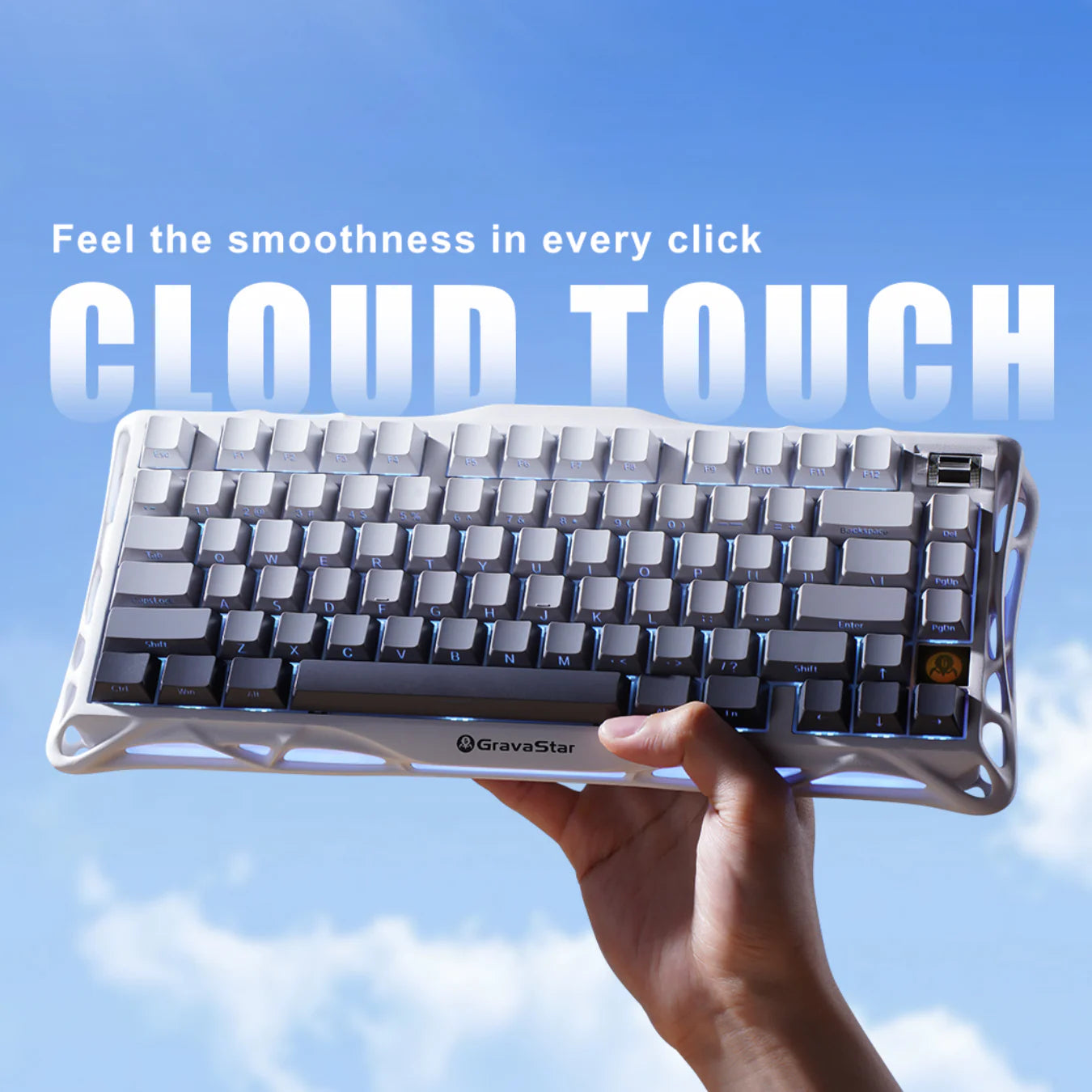 GravaStar Mercury K1 Gradient White – Handheld view of 75% wireless mechanical gaming keyboard with aluminum alloy gradient frame, custom linear switches, and cloud touch design.