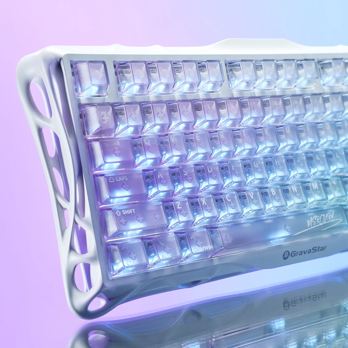 GravaStar Mercury K1 Lite Crystal Aurora Edition 75% mechanical gaming keyboard left side view – Highlighting crystal-clear PC transparent housing with GravaStar logo, purple and blue translucent keycaps, and dynamic RGB lighting reflection.