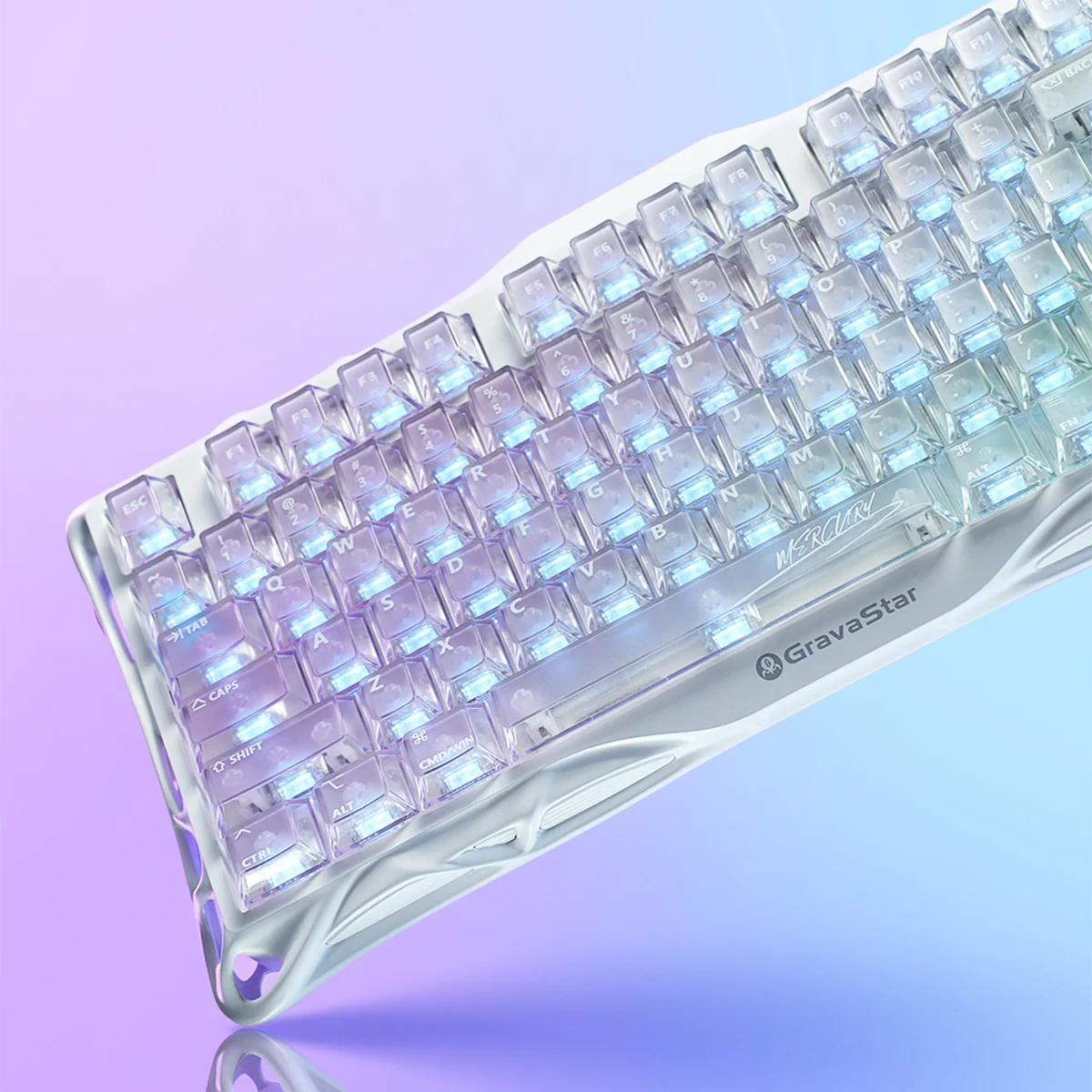 GravaStar Mercury K1 Lite Crystal Aurora Edition 75% mechanical gaming keyboard side macro view – Featuring crystal-clear PC transparent housing with GravaStar branding, purple and blue translucent keycaps, and dynamic RGB backlighting.
