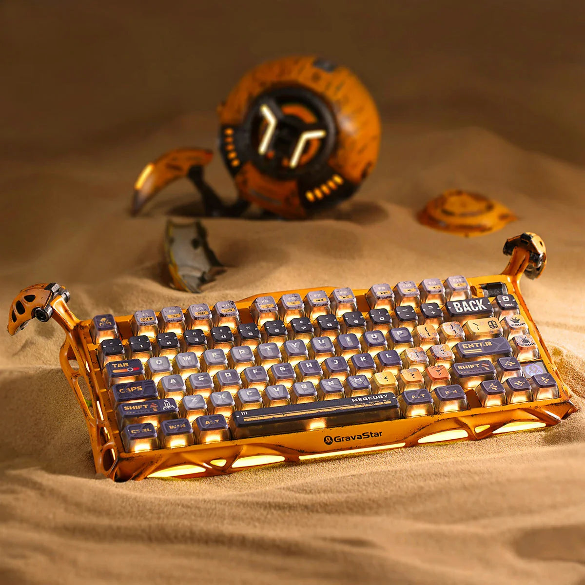 GravaStar Mercury K1 Pro Special Edition Battle-Worn Yellow – 75% wireless mechanical gaming keyboard with handcrafted aluminum alloy exoskeleton, Pudding PBT keycaps, hot-swap linear switches, and warm RGB lighting, styled with Mars Pro speaker in a cyberpunk gaming desk setup.
