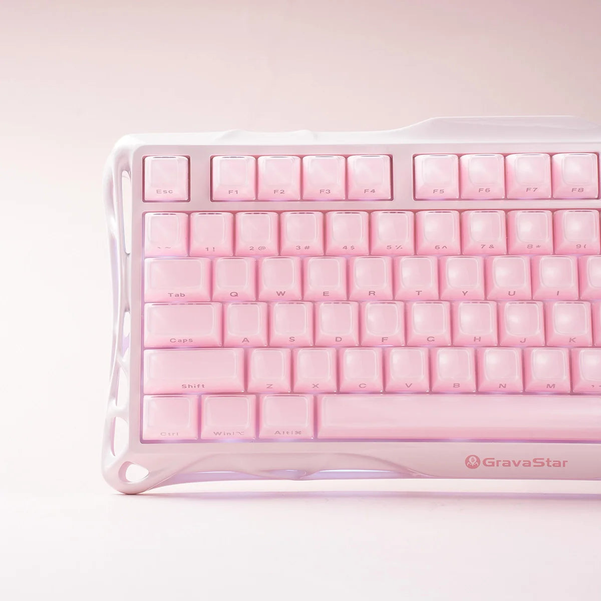 GravaStar Mercury K1 Special Edition Sakura Pink – Close-up view of aluminum alloy exoskeleton chassis, custom 40gf linear switches, Gasket mount structure, and PBT keycaps with customizable RGB lighting.