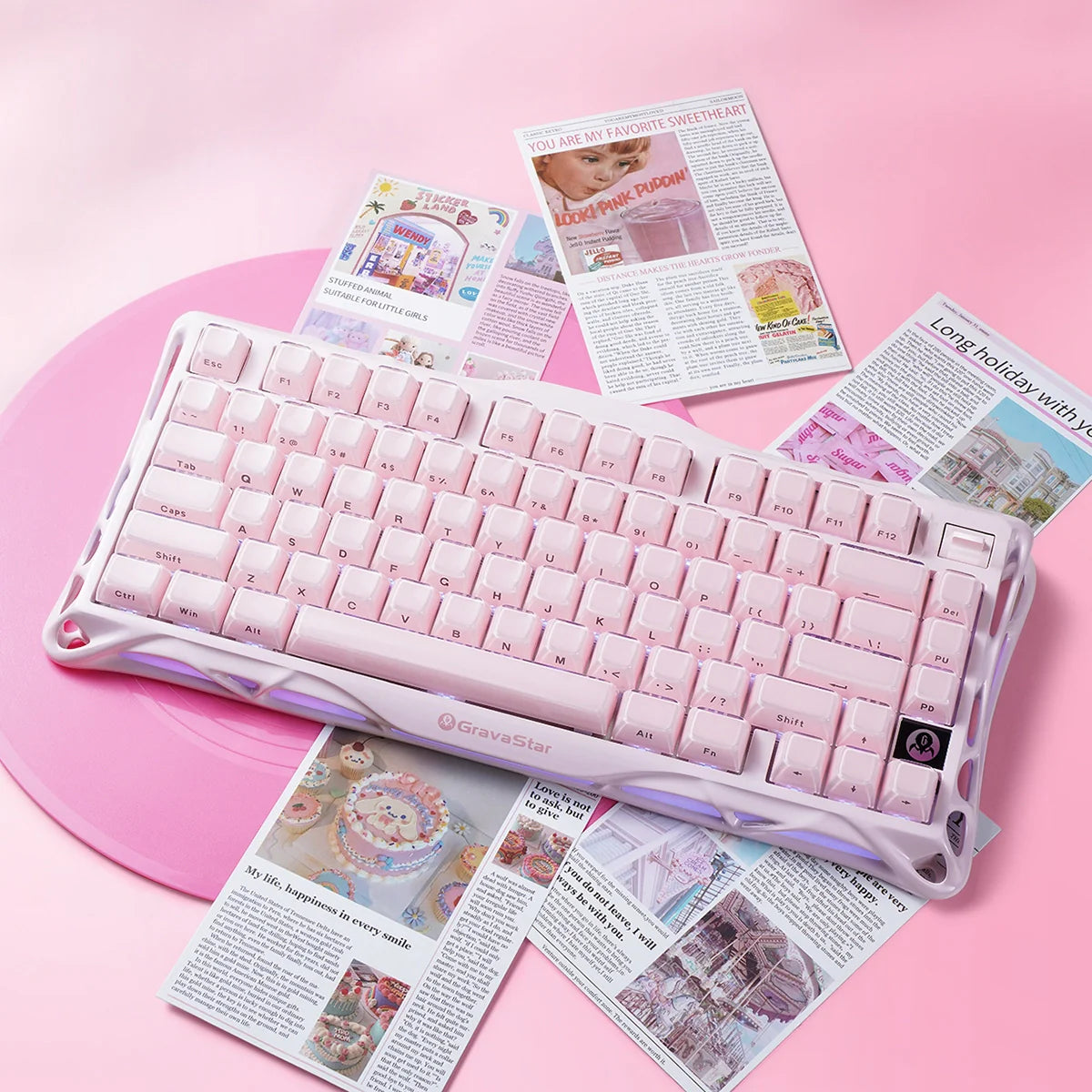 GravaStar Mercury K1 Special Edition Sakura Pink – Top-down view of 75% wireless mechanical gaming keyboard with aluminum alloy exoskeleton, PBT keycaps, and custom linear switches, styled with cherry blossom stickers in a kawaii gaming desk setup.