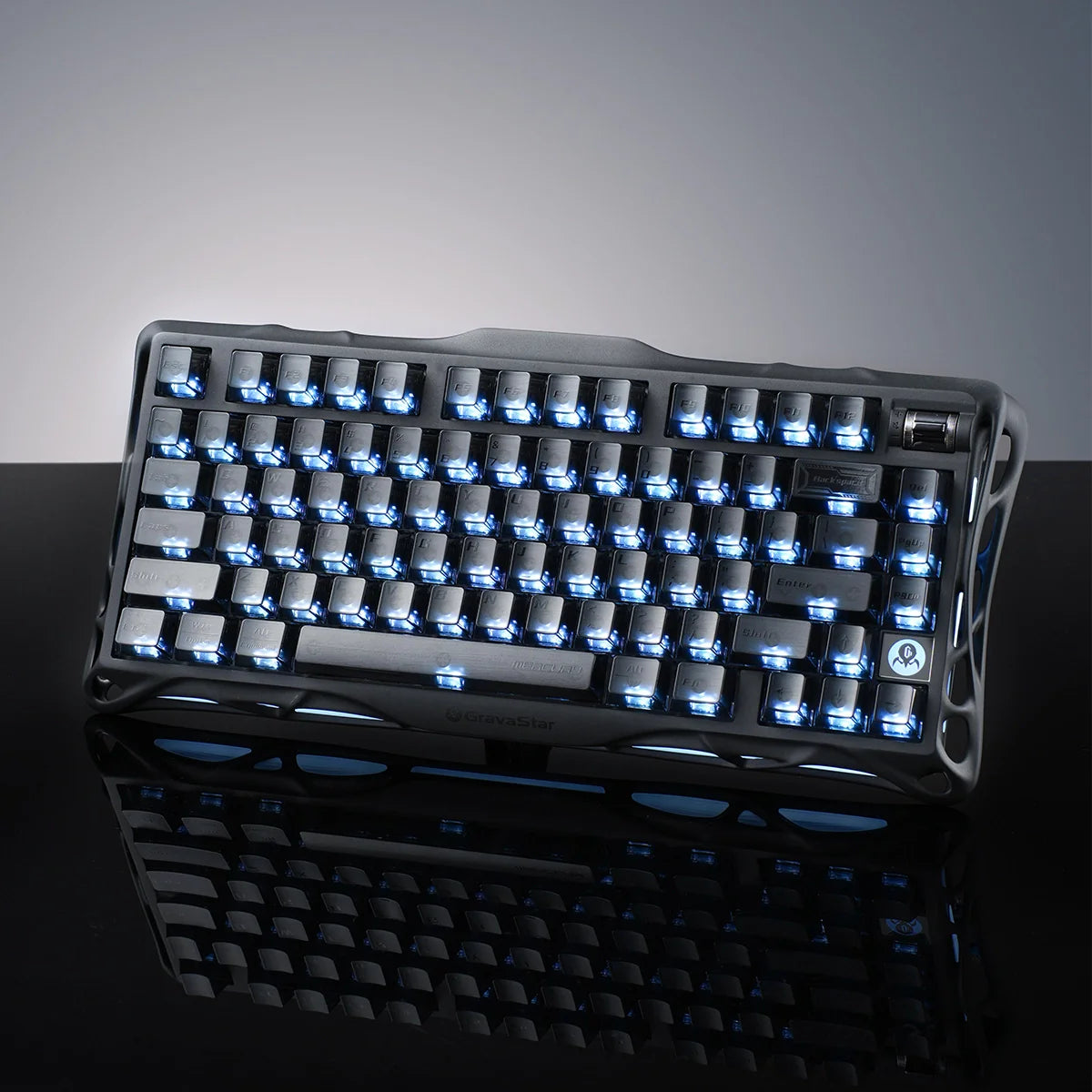 GravaStar Mercury K1 Stealth Black 75% mechanical gaming keyboard top view – Featuring matte black aluminum frame, custom Stellar Bloom linear switches, rotary knob, and dual RGB lighting, perfect paired with GravaStar M2 Stealth Black mouse.