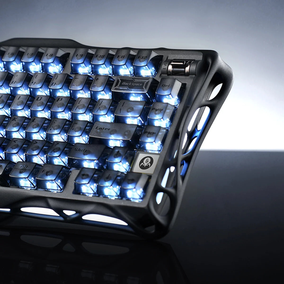 GravaStar Mercury K1 Stealth Black 75% mechanical gaming keyboard macro view – Showcasing hollowed aluminum alloy chassis, translucent PBT keycaps, custom Stellar Bloom linear switches, and dual RGB backlighting.