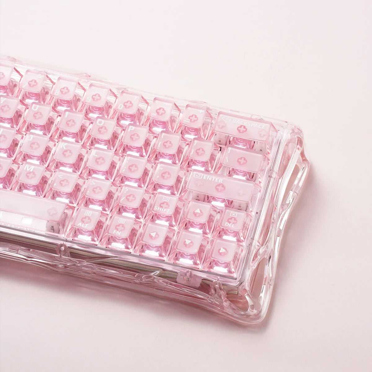 GravaStar Mercury V60 Crystal Rose 60% magnetic gaming keyboard macro view – Highlighting transparent rose crystal chassis, UFO Hall Effect magnetic switches, 0.005mm adjustable actuation, and RGB lighting, perfect paired with Mercury M2 Crystal Rose mouse and Mars Pro speaker.