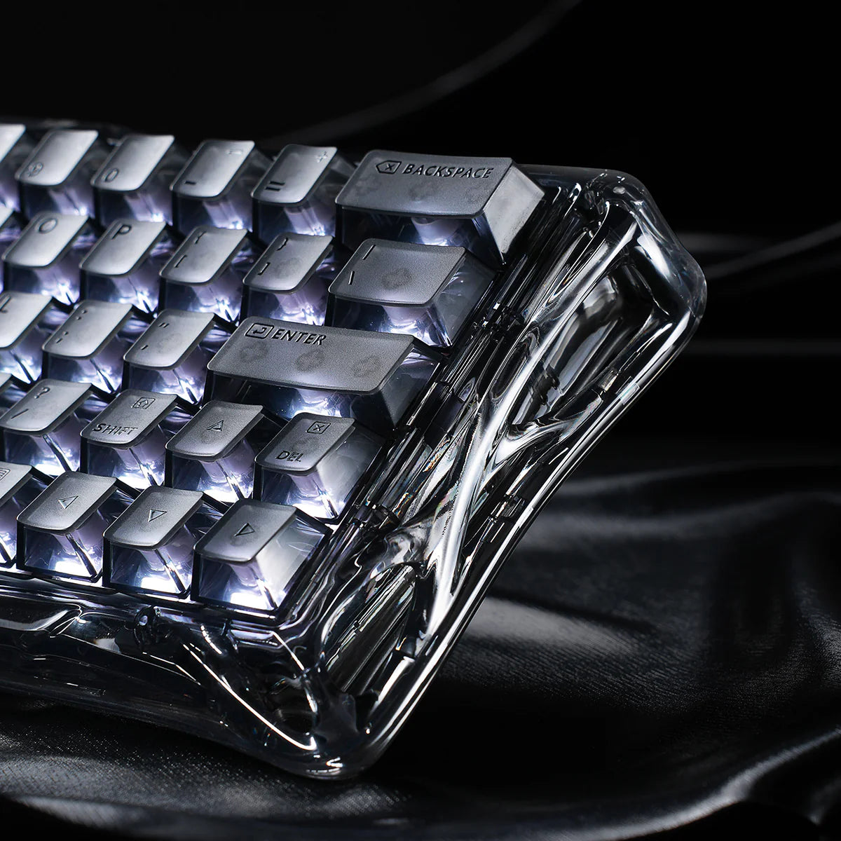 GravaStar Mercury V60 Onyx Crystal 60% transparent magnetic gaming keyboard right macro view – Showcasing Onyx Crystal transparent PC housing, translucent keycaps, and dynamic RGB backlighting reflection.