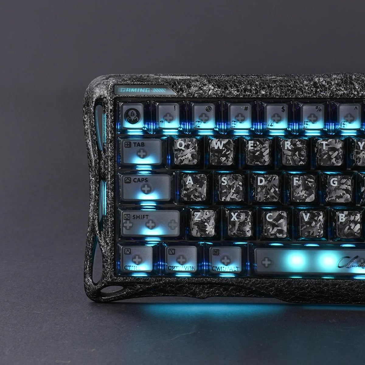 GravaStar Mercury V60 Pro Special Edition Cyber Frost Black - Close-up view of the left key cluster featuring ice blue RGB backlighting, tactical carbon texture aluminum frame, True 8kHz polling rate, and 0.125ms latency for FPS esports.