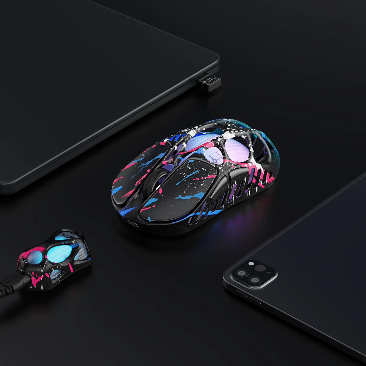 GravaStar Mercury X Pro 8KHz Wireless Gaming Mouse in Neon Graffiti shown on desk setup with matching 8K wireless dongle – Highlighting 49g magnesium alloy skeleton, street art splatter design, PAW 3950 32K DPI sensor, native 8000Hz polling rate, and blue RGB lighting.