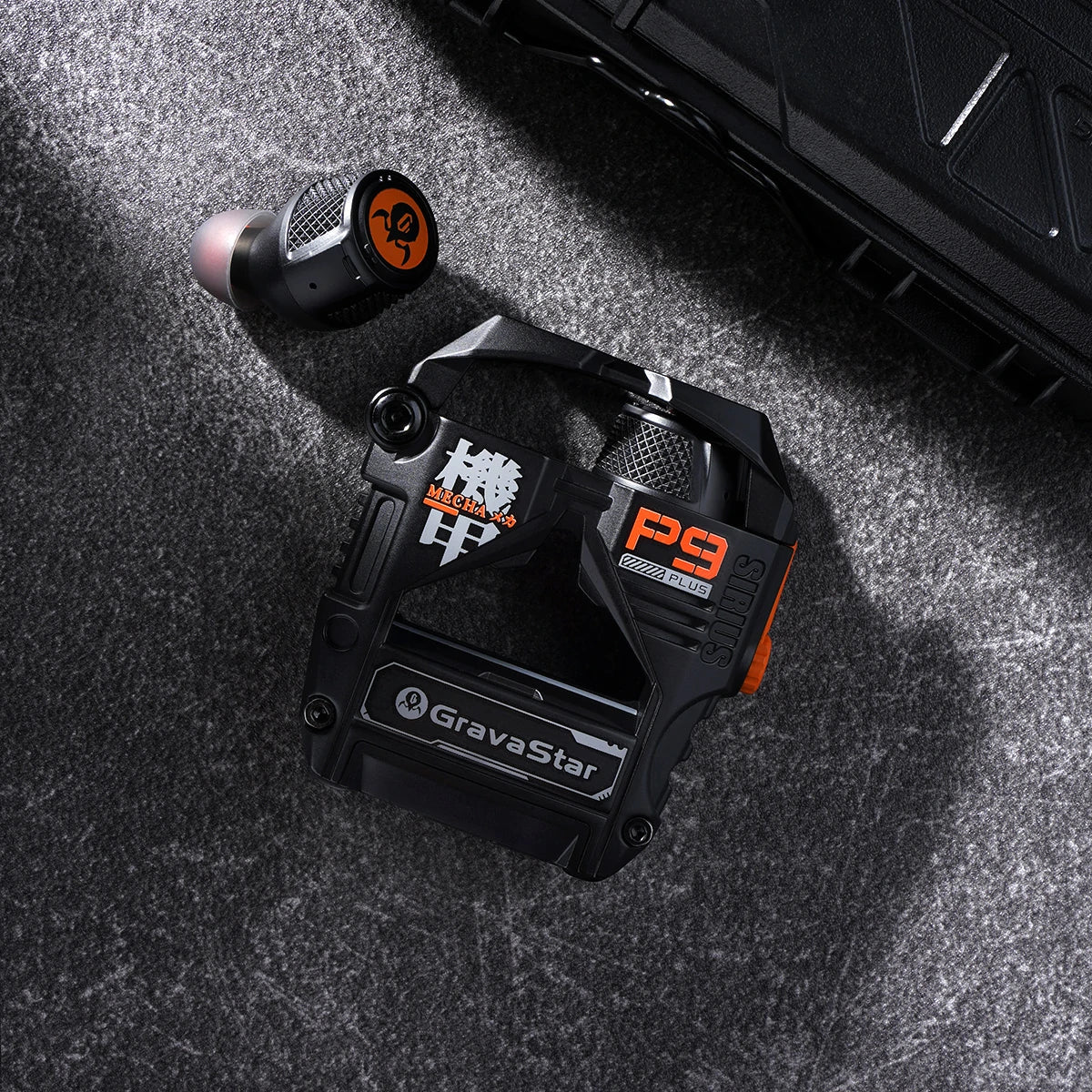 GravaStar Sirius Plus Black wireless ANC earbuds tactical top-down view on textured asphalt featuring matte black zinc aluminium alloy mecha frame, bottle opener shell, 10mm dynamic drivers, hybrid ANC noise cancellation, and RGB lighting, perfect paired with Mercury X Air Onyx Crystal mouse and Mercury K1 Stealth Black keyboard.