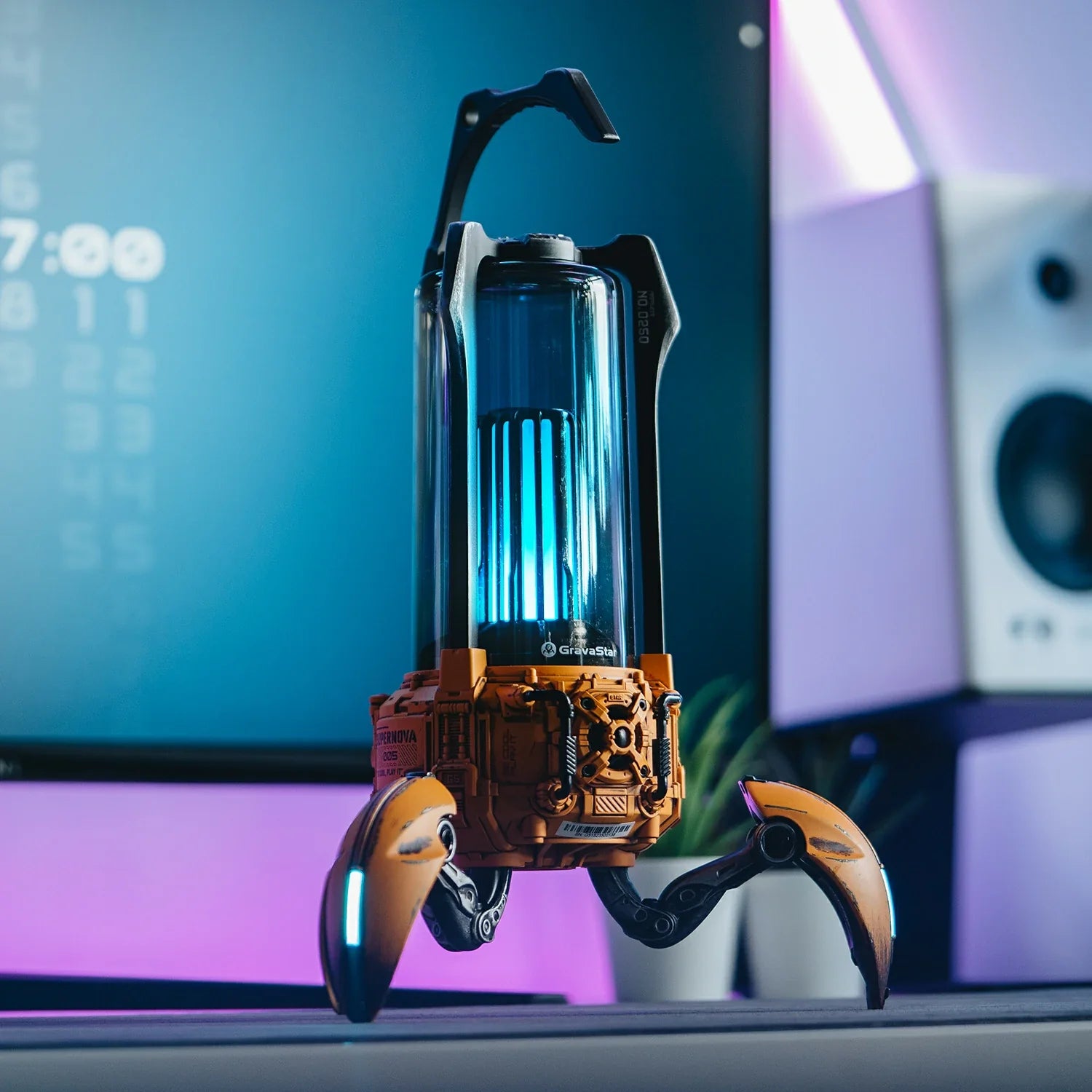 GravaStar Supernova War Damaged Yellow handcrafted mecha-lantern Bluetooth speaker setup angled view featuring 25W dual-driver sound system, 3" woofer, 0.5" tweeter, zinc alloy frame, foldable tripod stand, carry handle, and vibrant RGB lighting, perfect paired with Mercury X Pro Yellow mouse and Mercury K1 Pro Yellow keyboard.